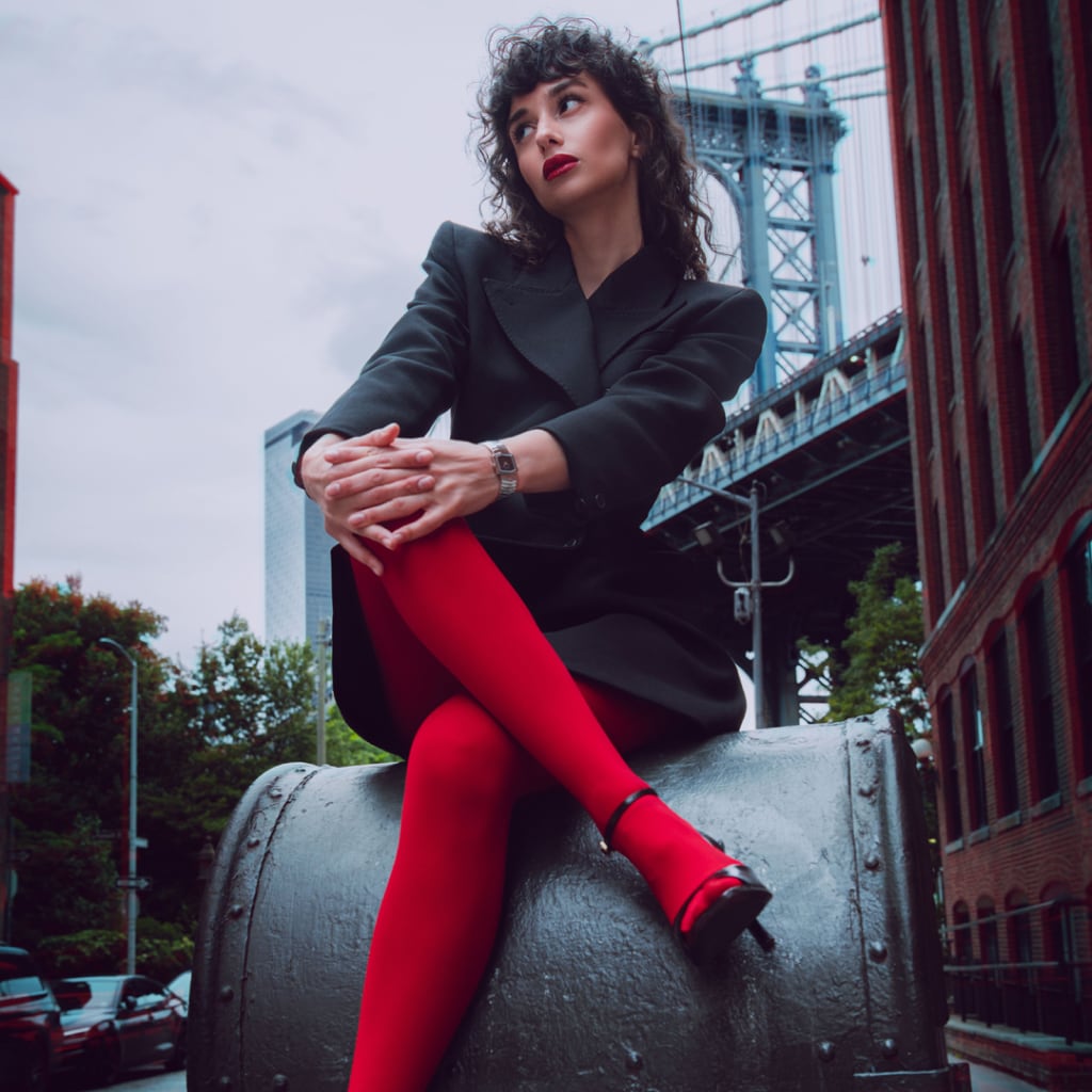 Lifestyle wrist shot of the Balmain Taffetas watch, showcasing its rose gold PVD tones and elegant sporty design on a woman’s wrist.
