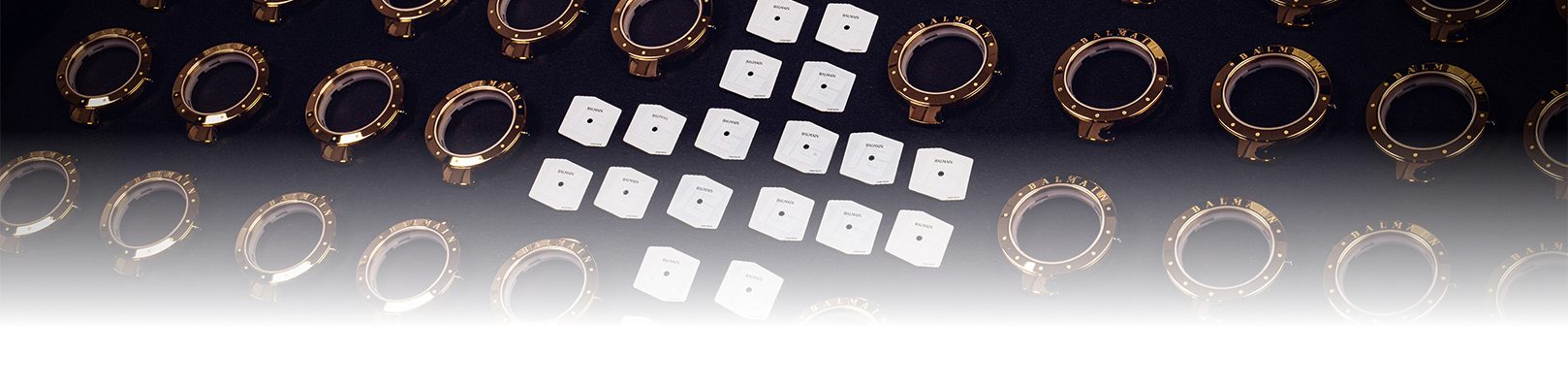 A skilled watchmaker carefully assembling a Balmain timepiece, showcasing Swiss precision