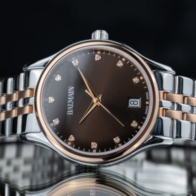 A Swiss Made timepiece combining Parisian Haute Couture elegance with Swatch Group precision quartz movement.